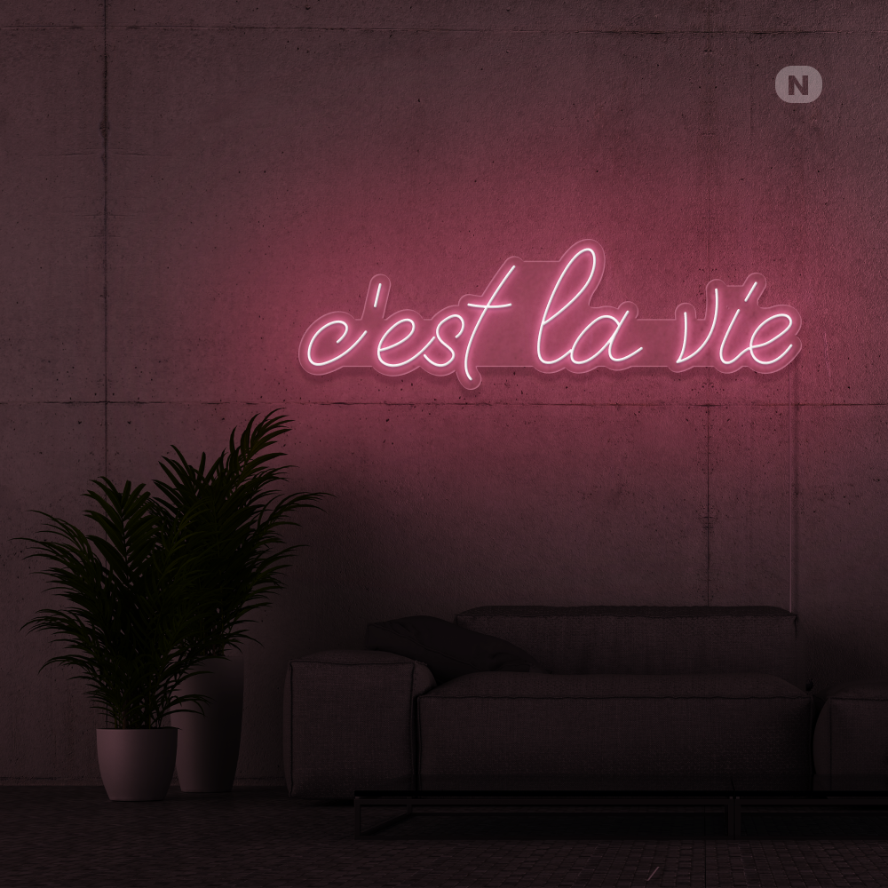 Insegna al neon c'est la vie